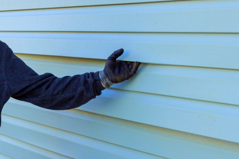 Blue Siding Installation